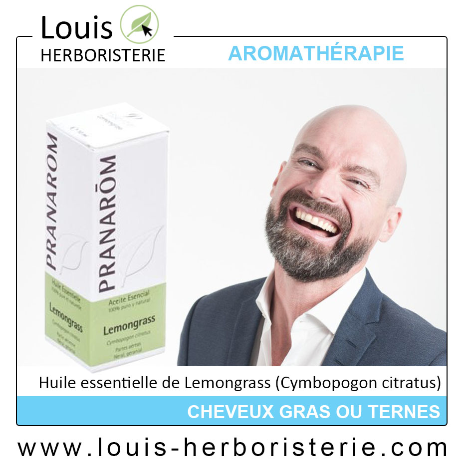 Photo d'un chauve qui sourit à côté d'une huile essentielle de Lemongrass utile pour les cheveux