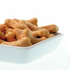 Bol blanc rempli de biscuits Bio-Bones en forme d’os, à la volaille et aux baies d’aronia